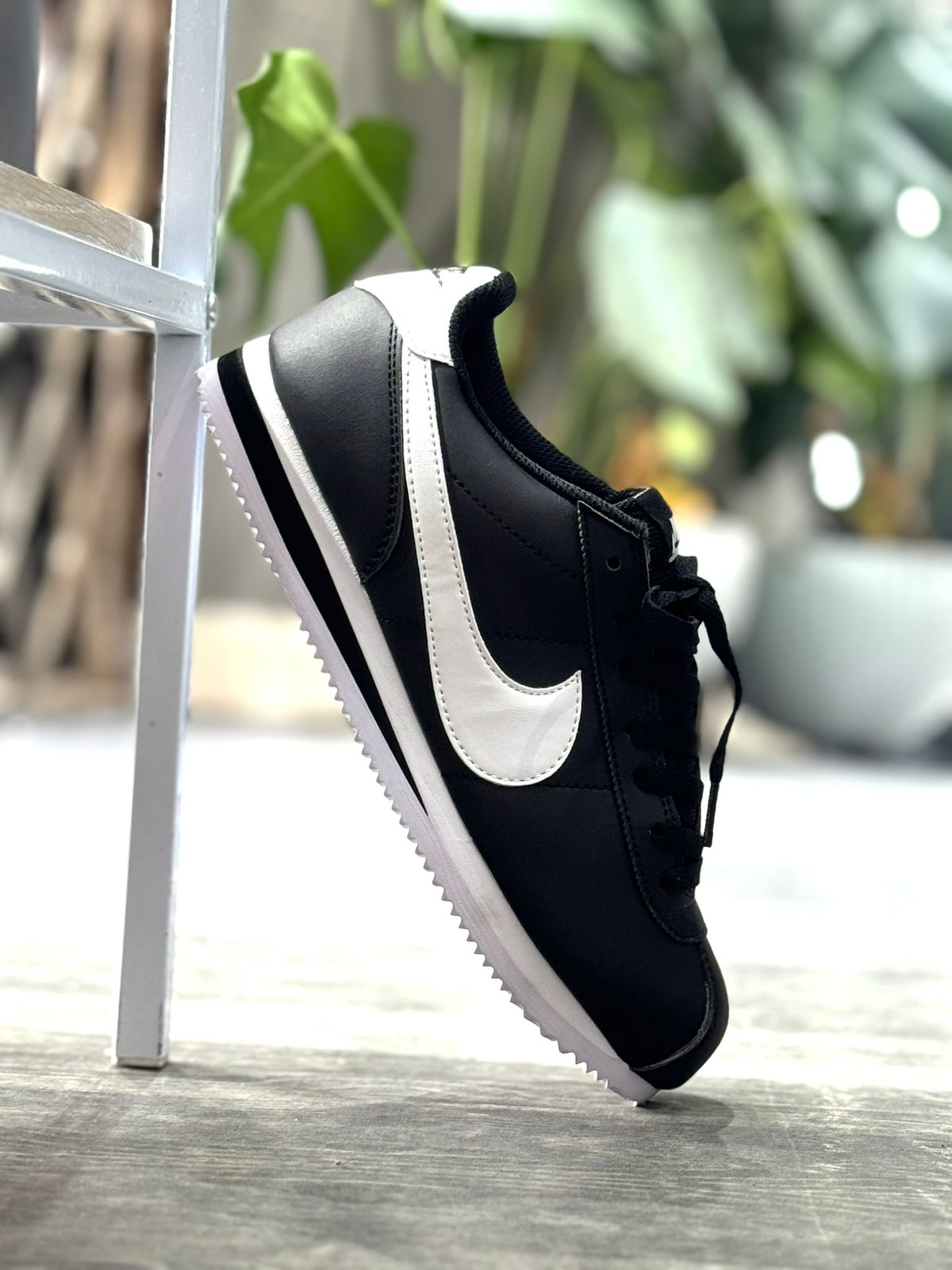 NIKE CORTEZ BLACK AND WHITE