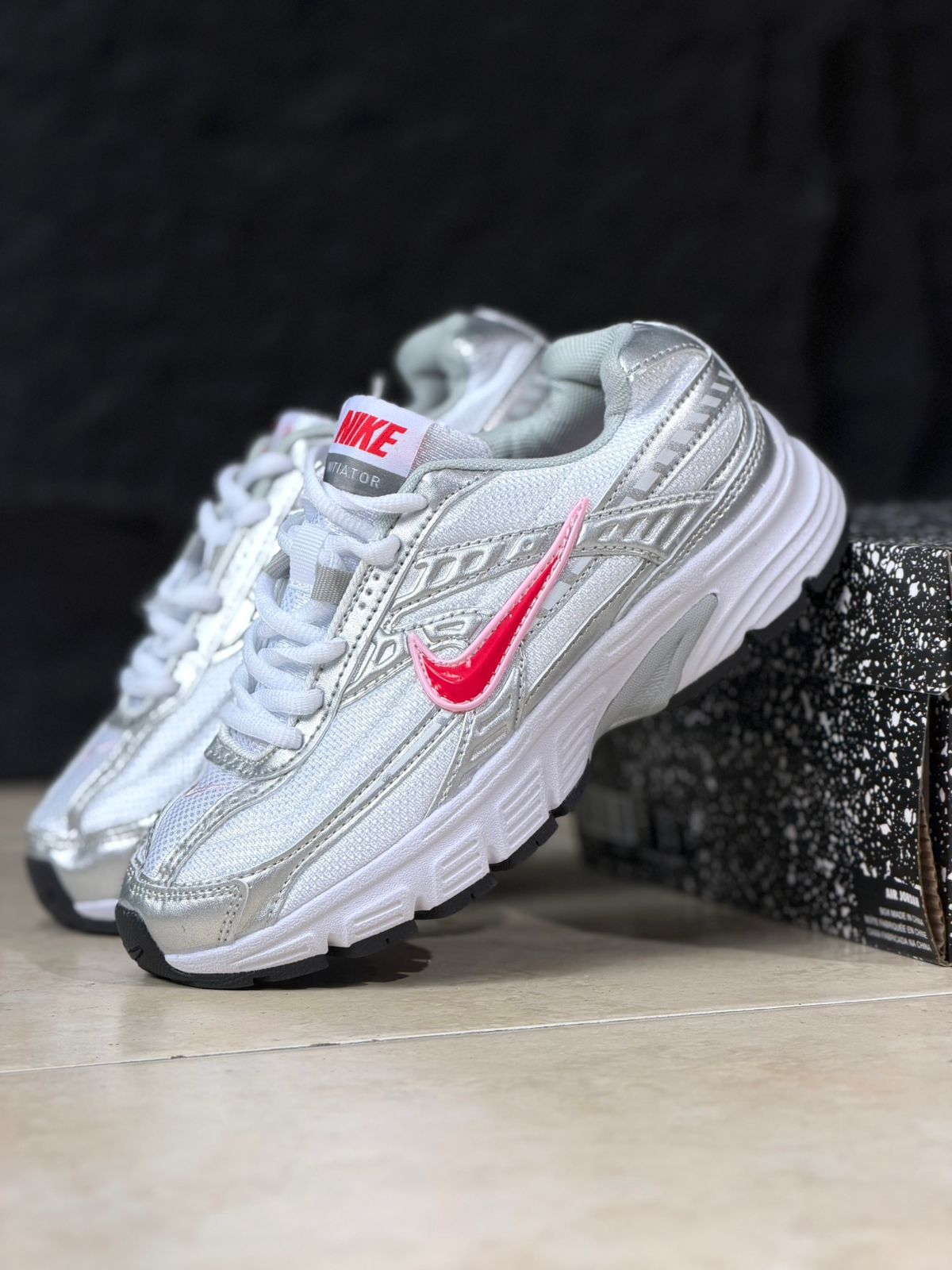 NIKE INITIATOR WITH A RED SWOOSH